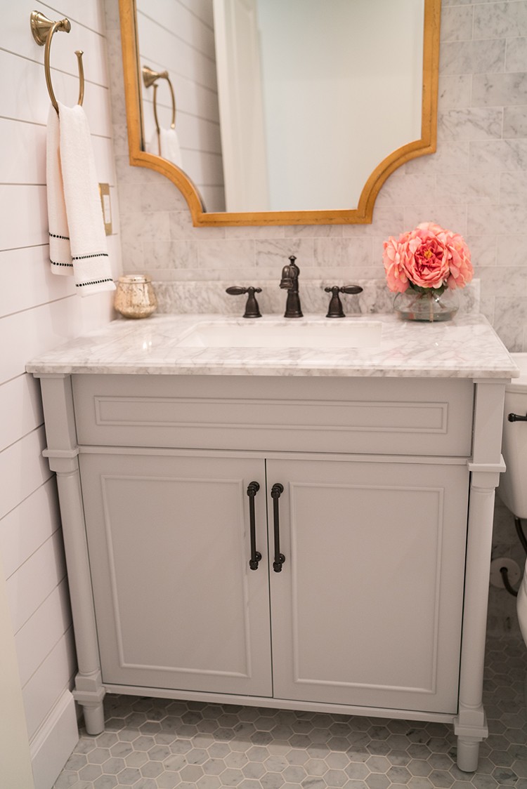 Katelyn Jones of A Touch of Pink takes on a beautiful bathroom remodel starring the Delta UPstile Wall System. Read below to see the full transformation from the demo to the final finished space.