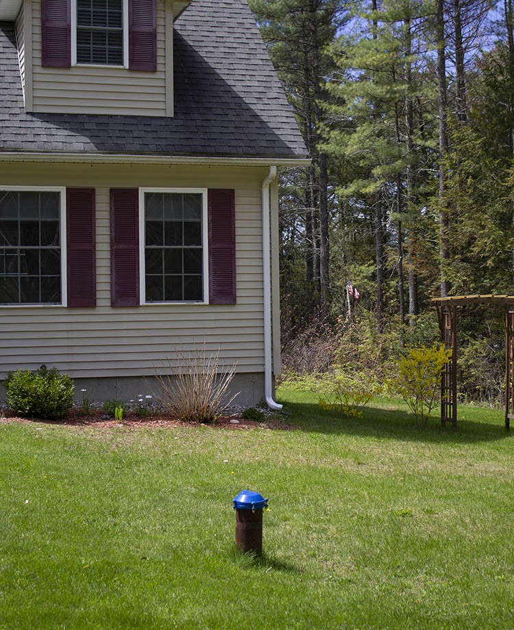 How to Hide a Front Yard Drilled Wellhead